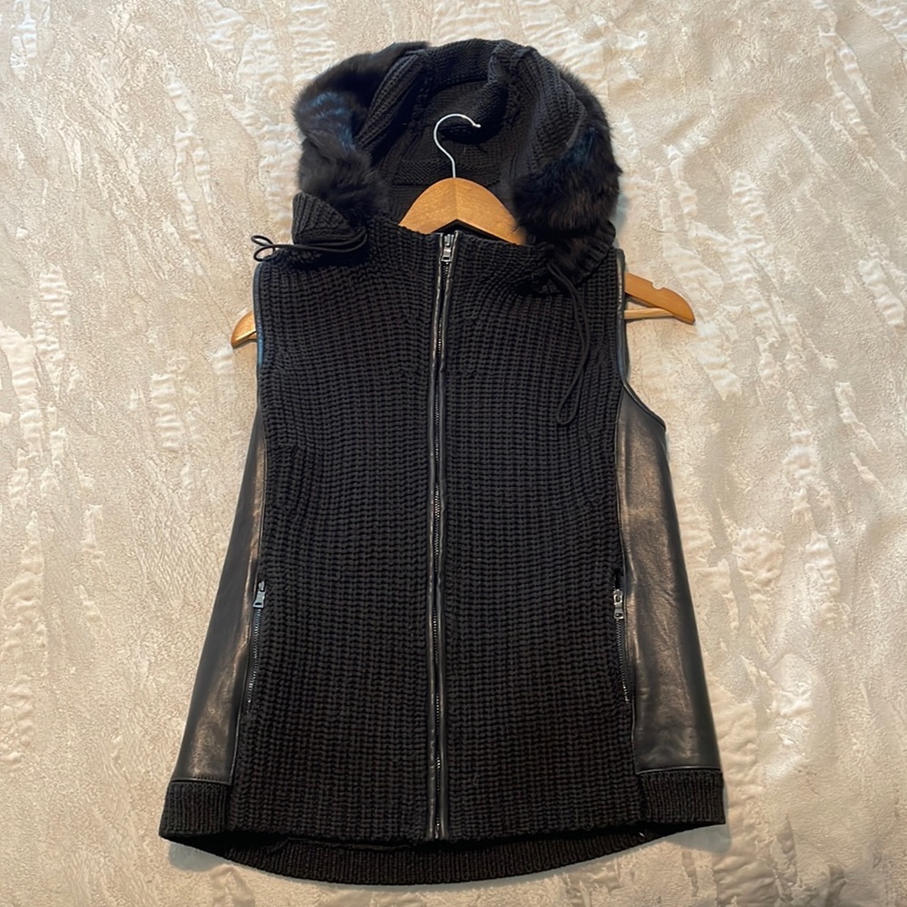 Barely worn Elie Tahari brown vest with leather trim on the side and fur hood